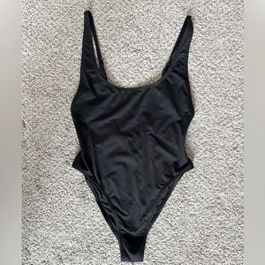 SKIMS one piece swimsuit.